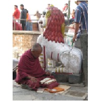 monk praying,Katmandu.JPG